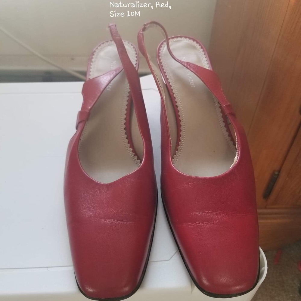 Red high open heel shoes